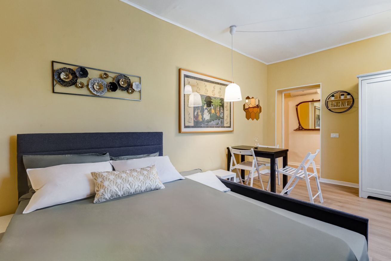 Desk, iron/ironing board, travel crib