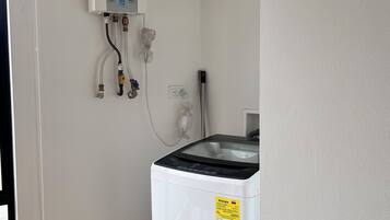 Apartamento standard, para não fumantes | Lavanderia