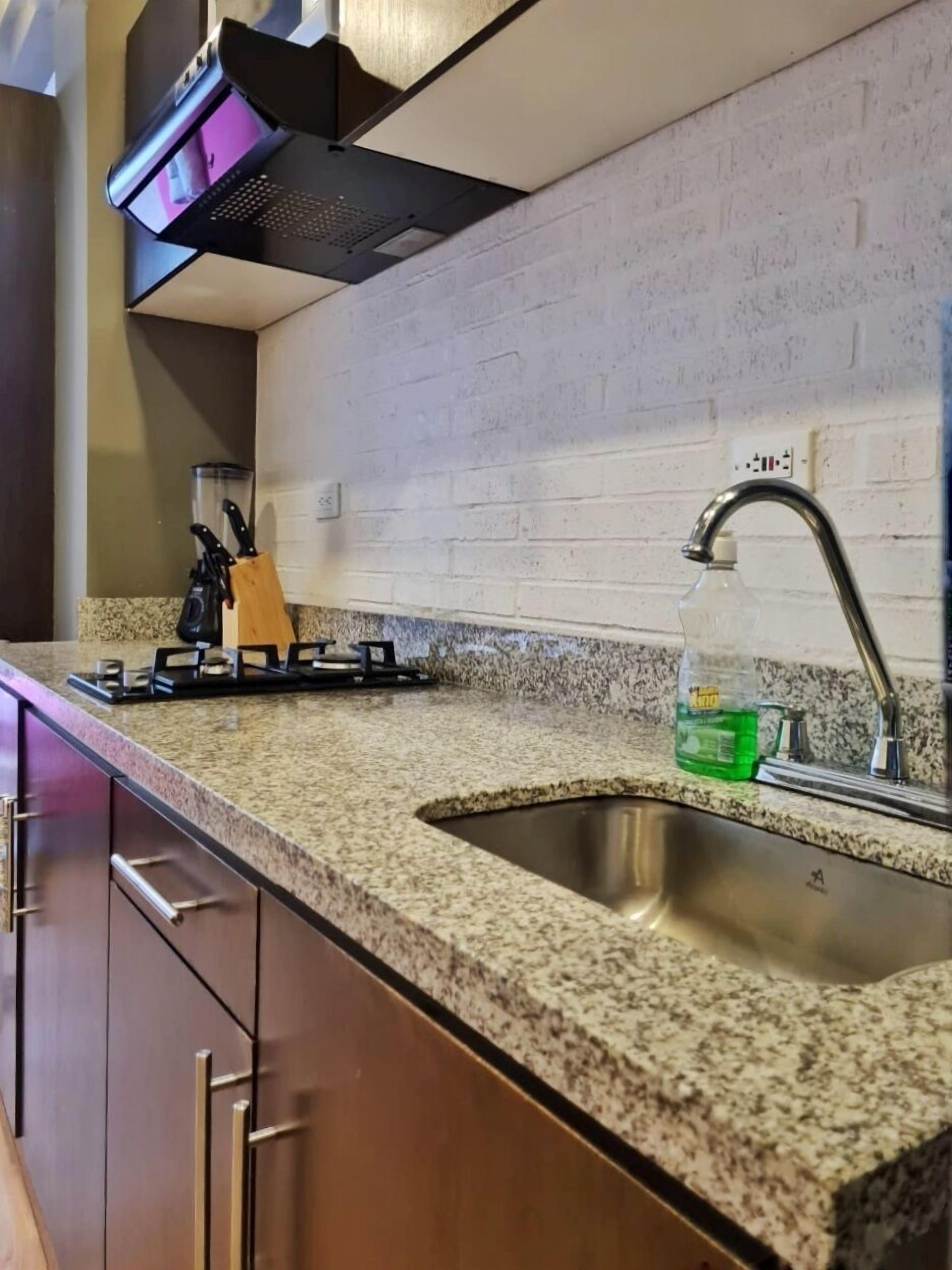 Fridge, microwave, cookware/dishes/utensils