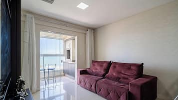 Apartamento básico | Área de estar | Smart TV 32 polegadas com canais digitais