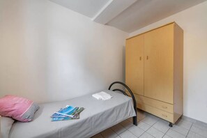 Apartamento, 2 quartos, varanda, vista para o jardim | 3 quartos