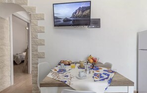 Apartment, 2 Bedrooms, Balcony, City View | Dining room - Cozy Flat Steps From Porto Torres Beaches (Porto Torres)