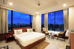 Executive Room, 1 King Bed, Balcony, City View | Iron/ironing board, free WiFi - Aarchh Regency (Noida)