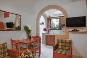 Family Apartment, Garden View | Private kitchen | Mini-fridge, stovetop, cookware/dishes/utensils - Irene Studios Patmos (Skala)