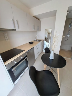 Double Room, Sea View | Private kitchen | Mini-fridge, oven, stovetop, cookware/dishes/utensils - Apeiron Akrotiri by Apeiron Hotels (Santorini)