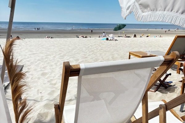 On the beach, sun loungers