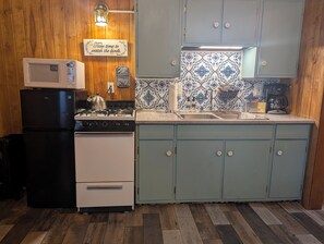 Suite estándar | Cocina privada | Microondas y cafetera o tetera