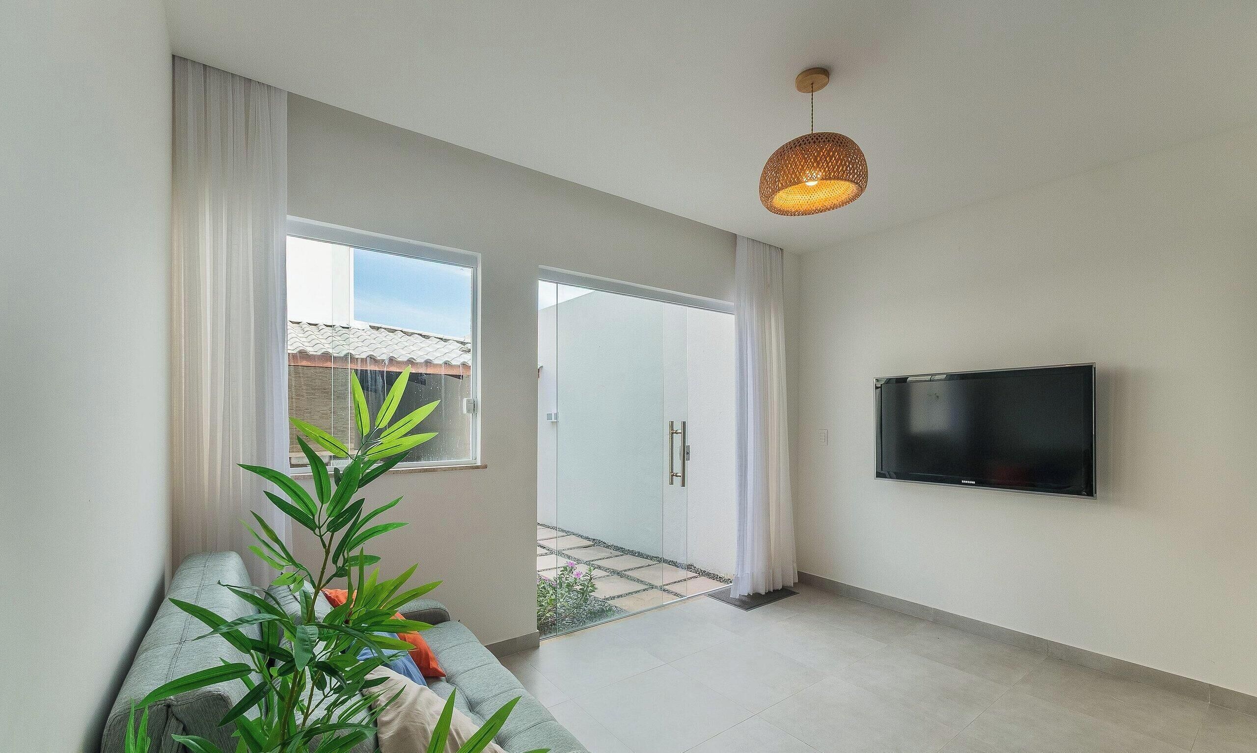 Apartamento básico | Área de estar | Smart TV 32 polegadas com canais digitais