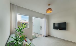 Appartement | Coin séjour | TV connectée de 32 pouces avec chaînes numériques