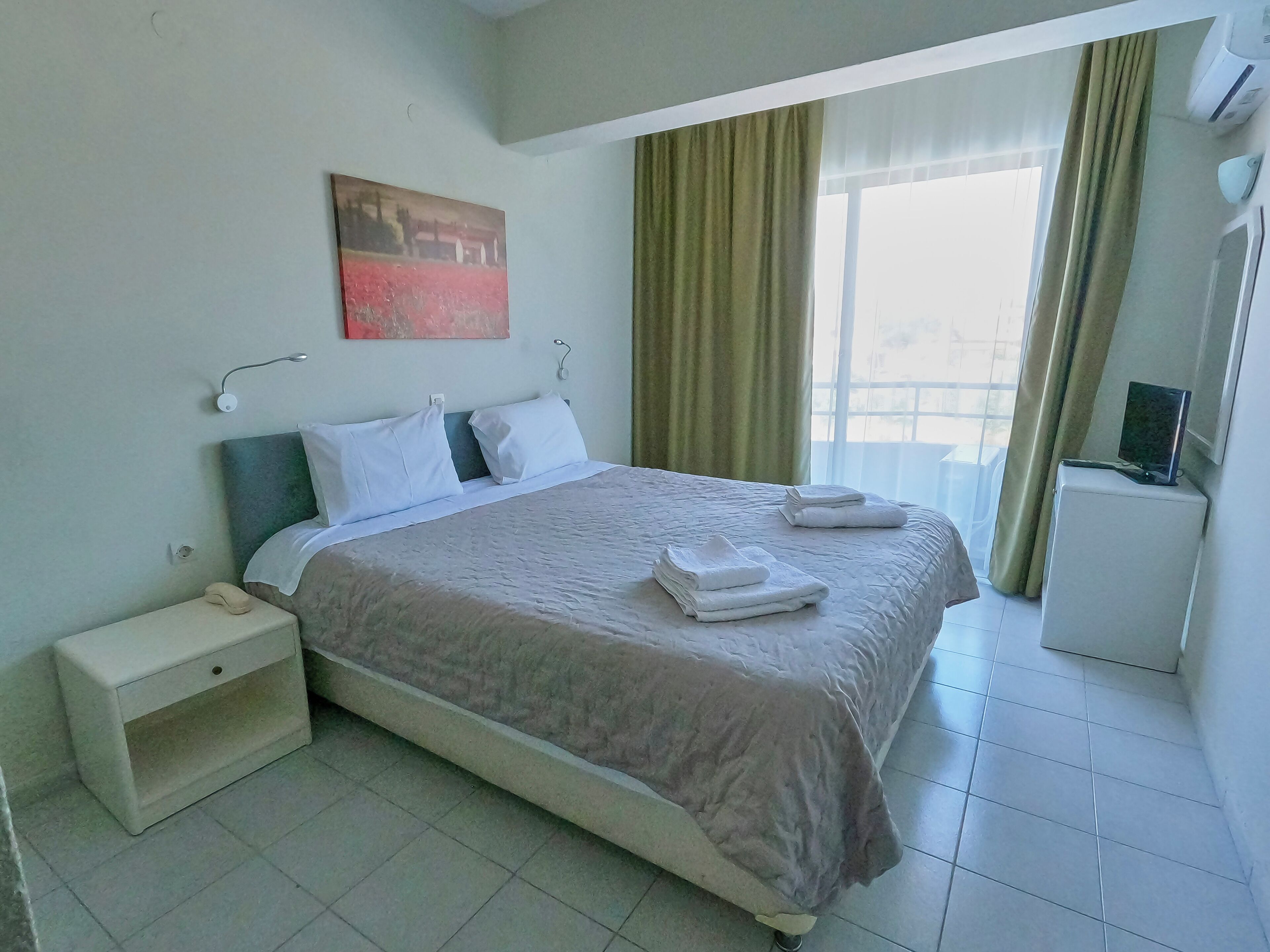 Family Quadruple Room, Garden View | Iron/ironing board, free WiFi