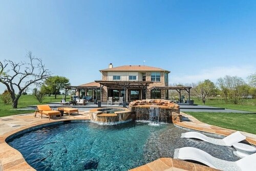Lakefront home with heated pool on 12 acres