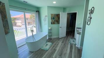 Shower, hair dryer, towels, shampoo