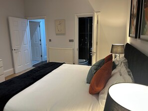 2 dormitorios, tabla de planchar con plancha, wifi gratis y ropa de cama