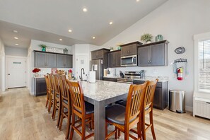 Fridge, microwave, oven, stovetop - Spacious home with Lake Views, Hot Tub & Beach Access (Garden City)