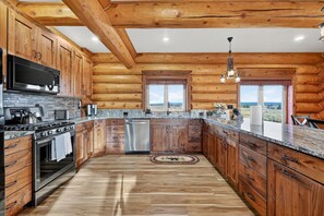 Fridge, microwave, oven, stovetop - Buckskin Flats | By the Lake! Boat Ramp, Hot Tub, AC & Sleeps 18! (Island Park)