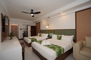 Deluxe Room, Pool View | In-room safe, desk, laptop workspace, blackout drapes