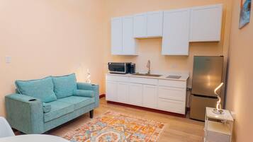 Luxury-Suite, Balkon, Meerblick | Wohnbereich | Drucker