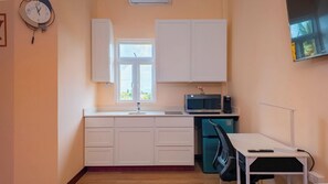 Deluxe Studio | Living area | Printers - MDG Suites (Georgetown)