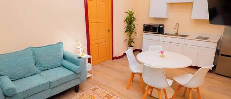 Luxury Suite, Balcony, Ocean View | Living area | Printers