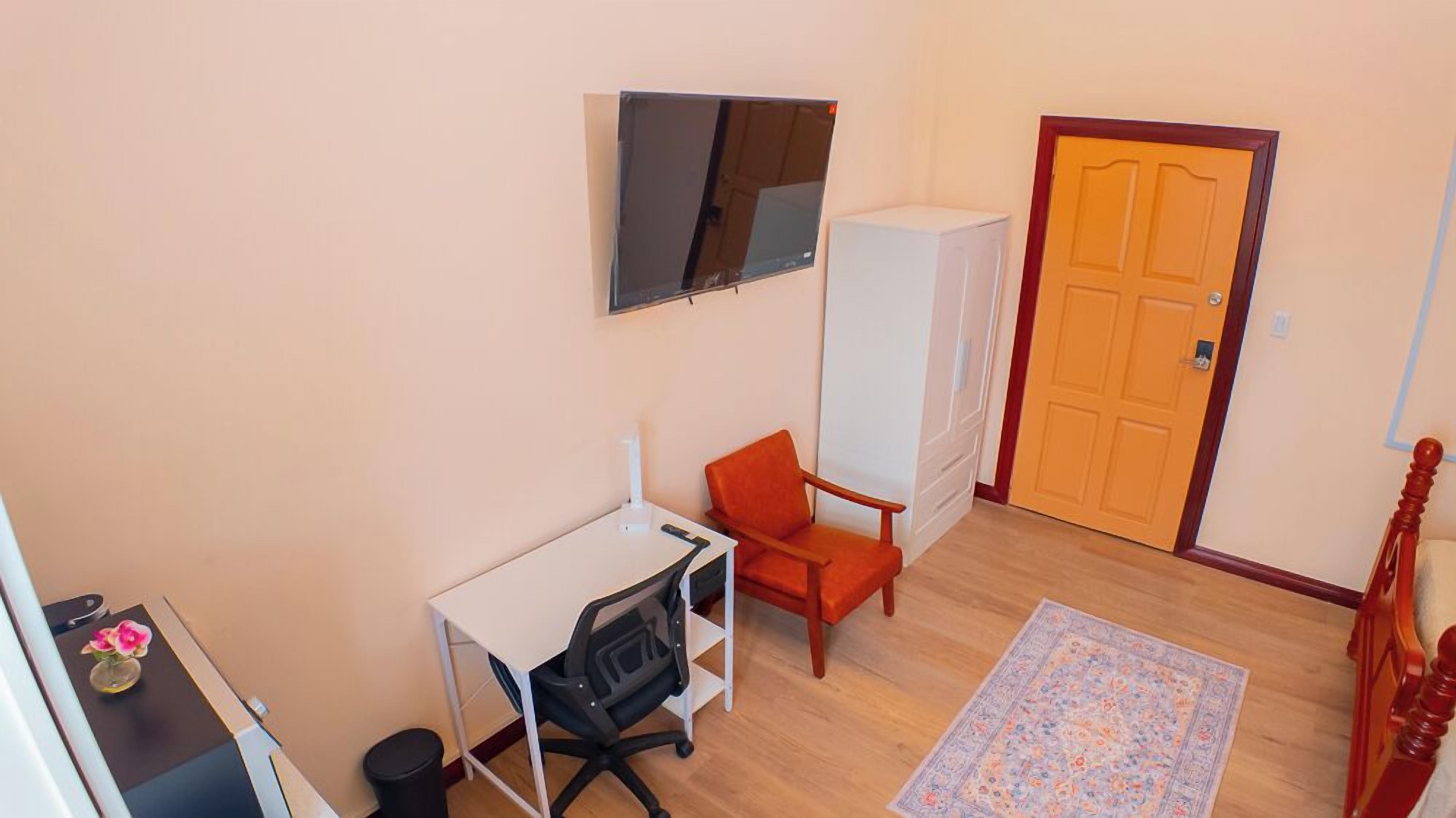 Deluxe studio | Woonruimte | Een printer