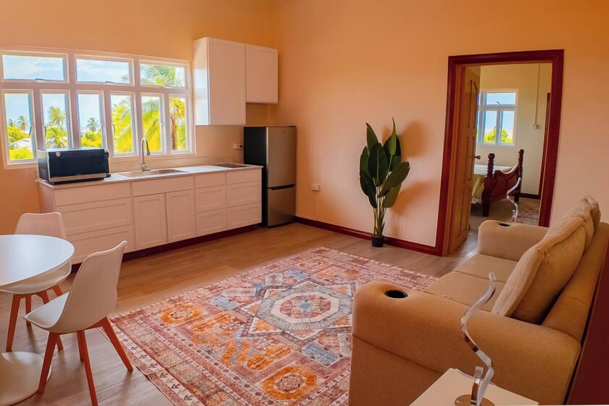 Executive Suite, Balcony, Ocean View | Living area | Printers