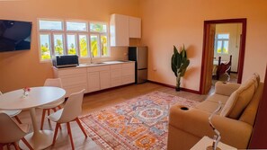 Executive Suite, Balcony, Ocean View | Living area | Printers - MDG Suites (Uitvlugt)