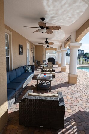 Terrace/patio - Spacious 5-bedroom pool house on Palm Coast canal, just minutes from the beach. (Palm Coast)
