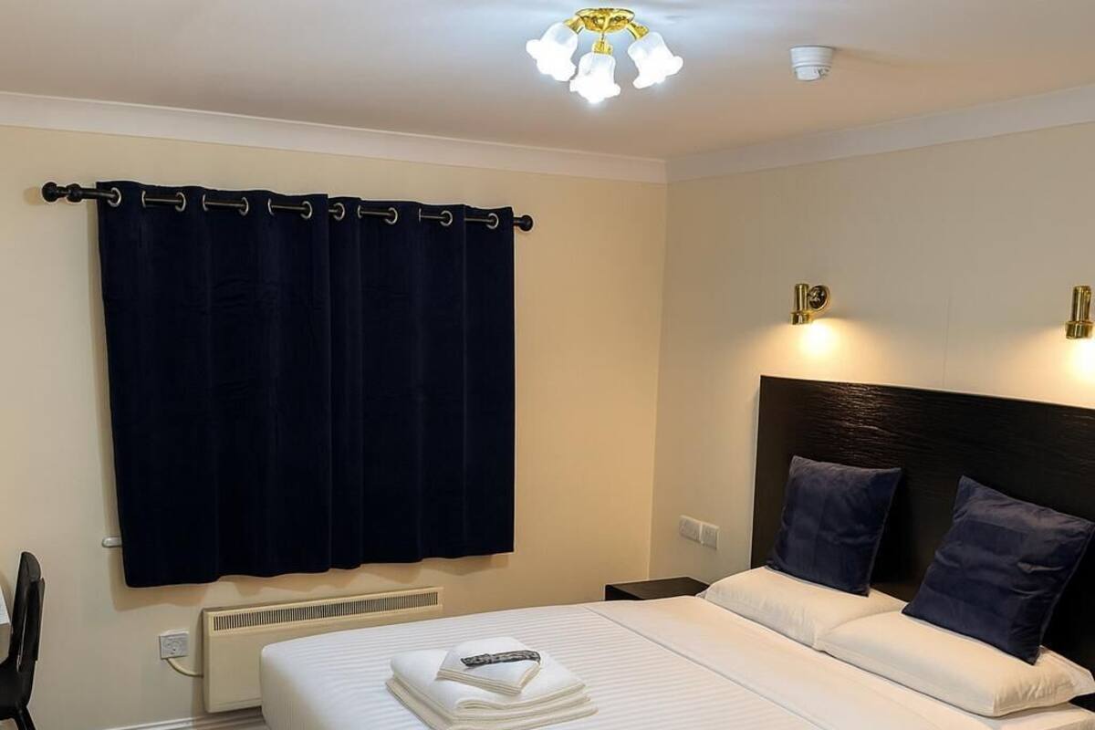 Economy Double Room, Garden View | Desk, free WiFi