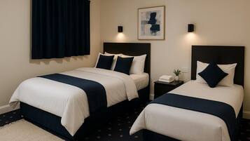 Family Triple Room, Garden View | Desk, free WiFi