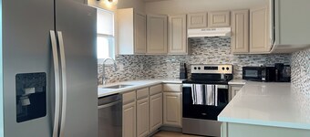 Contemporary 4BR Home with Office, Fire Pit & Large Fenced Yard