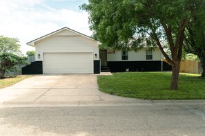 Exterior - Contemporary 4BR w/ Office, Firepit, Full Kitchen, Laundry & Large Backyard (Wichita)