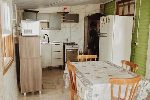 Casa com Churrasqueira Quintal Ar Cond e Garagem