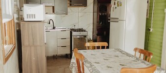 Casa com Churrasqueira Quintal Ar Cond e Garagem