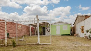 Unclassified image, 3 of 27, button - Casa com Churrasqueira Quintal Ar Cond e Garagem (Rio Grande)
