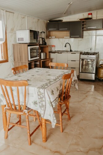 Casa com Churrasqueira Quintal Ar Cond e Garagem