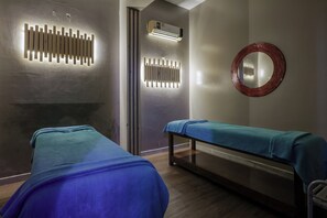 A room with two beds, a wall-mounted air conditioner, and a mirror. - Shoni Bay Resort (Marsa Alam)