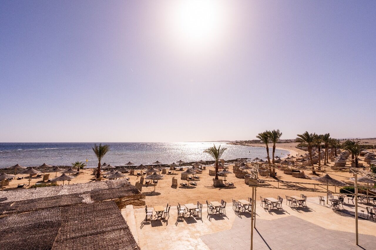 Beach umbrellas, beach towels, beach volleyball