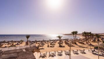 Beach umbrellas, beach towels, beach volleyball