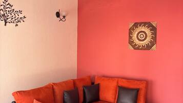 Suite Confort | Área de sala de estar