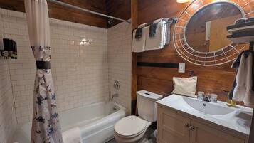 Eco-friendly toiletries, hair dryer, towels