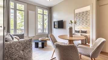 Family Apartment | Living area | 32-inch Smart TV with cable channels