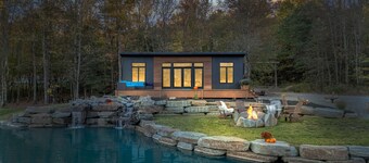 Luxury Tiny House Over a Waterfall on Private Tiny Lake Sleep to Waterfall Sound