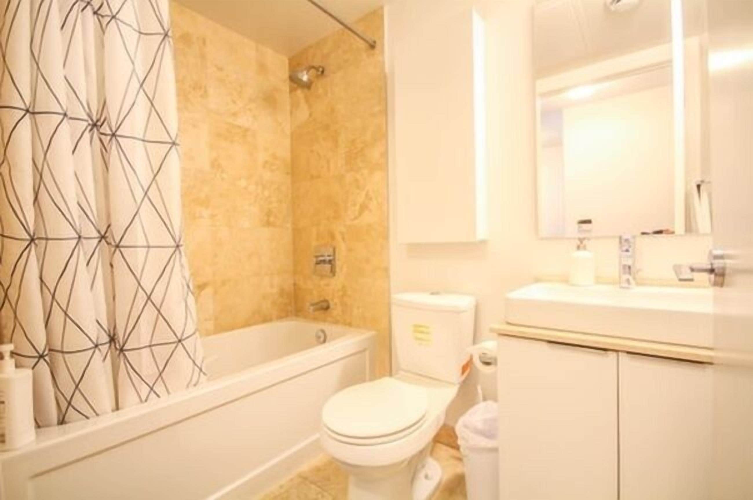 Exclusive Condo, City View | Bathroom | Hair dryer, towels, soap, shampoo