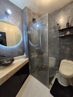 Shower, hair dryer, towels, soap
