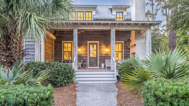 A wooden house with a porch, steps leading to the entrance, and a gravel pathway. - Cozy Fireplace on the Porch + Bunk Room, Close to Moreland Treehouse (Bluffton)