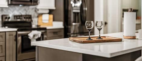 Coffee/tea maker, fridge, microwave, oven