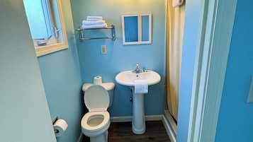 Shower, towels, soap, shampoo