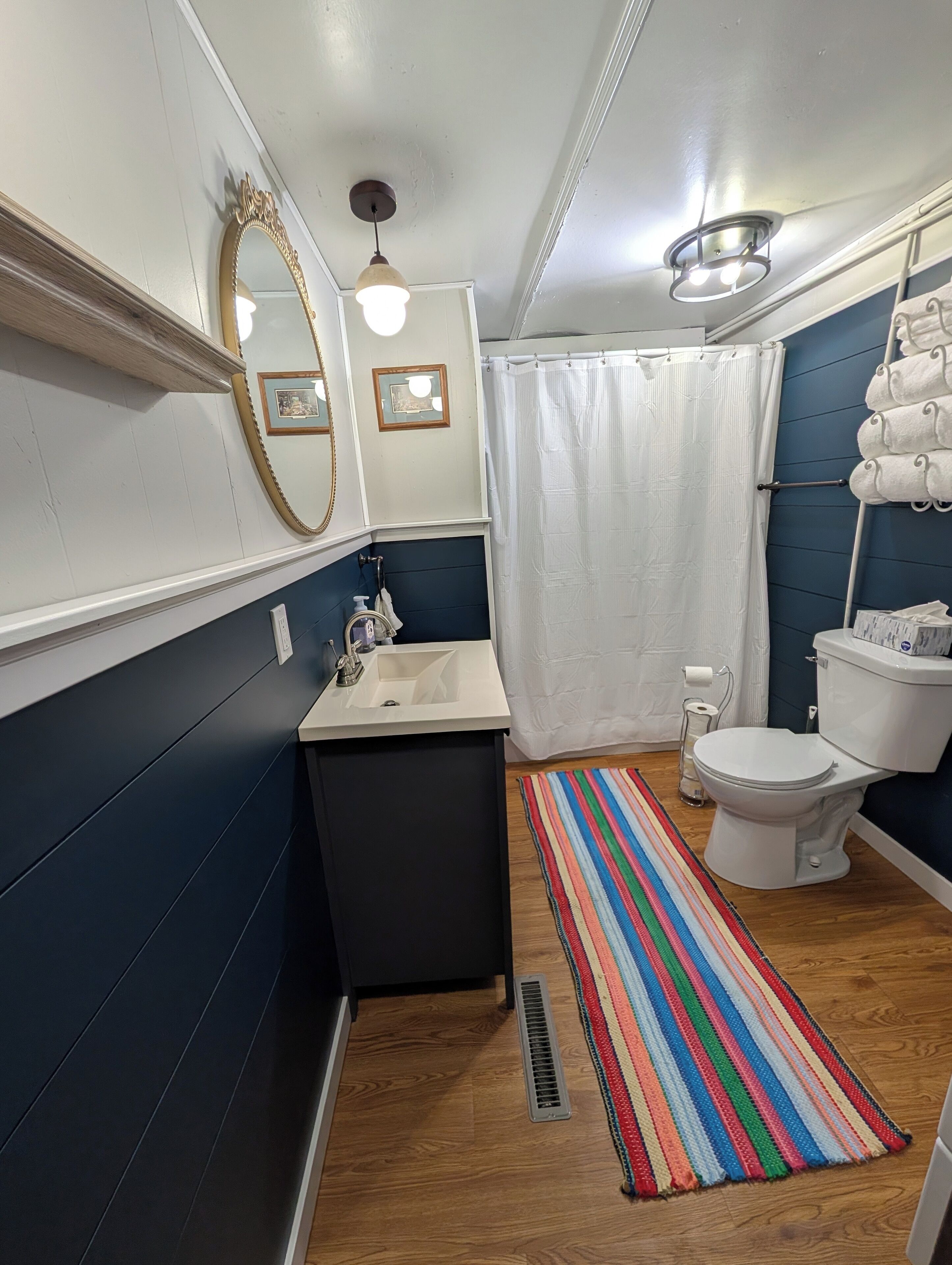 Shower, towels, soap, toilet paper