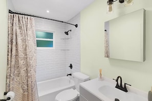 Hair dryer, towels, soap, shampoo