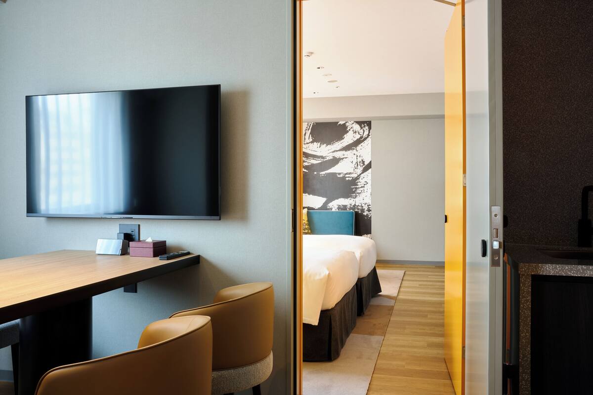 Family Suite | Hypo-allergenic bedding available, down comforters, in-room safe